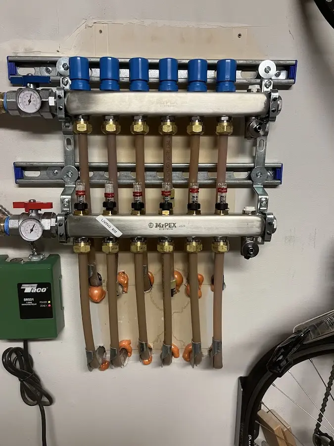 Plumber performing Water Heater Repair at a residential property in Oxford